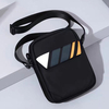 water resistant black small crossbody bag for men lightweight mini shoulder bag with adjustable shoulder strap